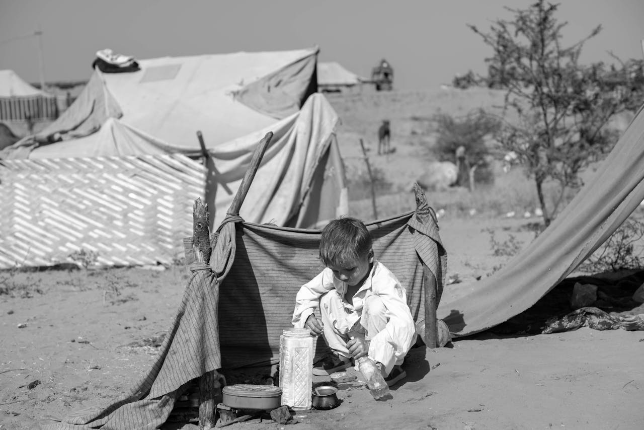 services-03 Kid Playing at a Desert Campsite